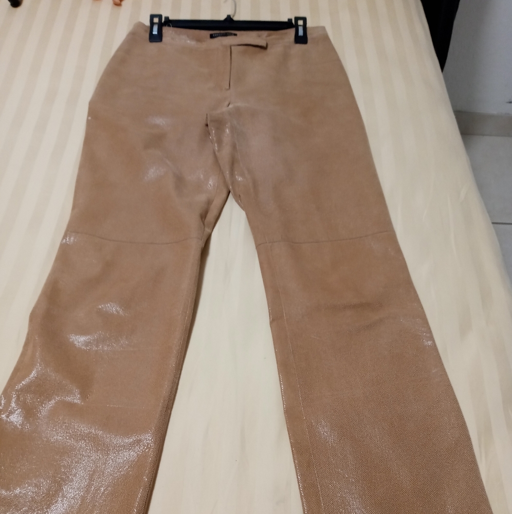 Women sneak leather pants